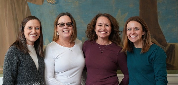 Pitt staff members posing for a photo